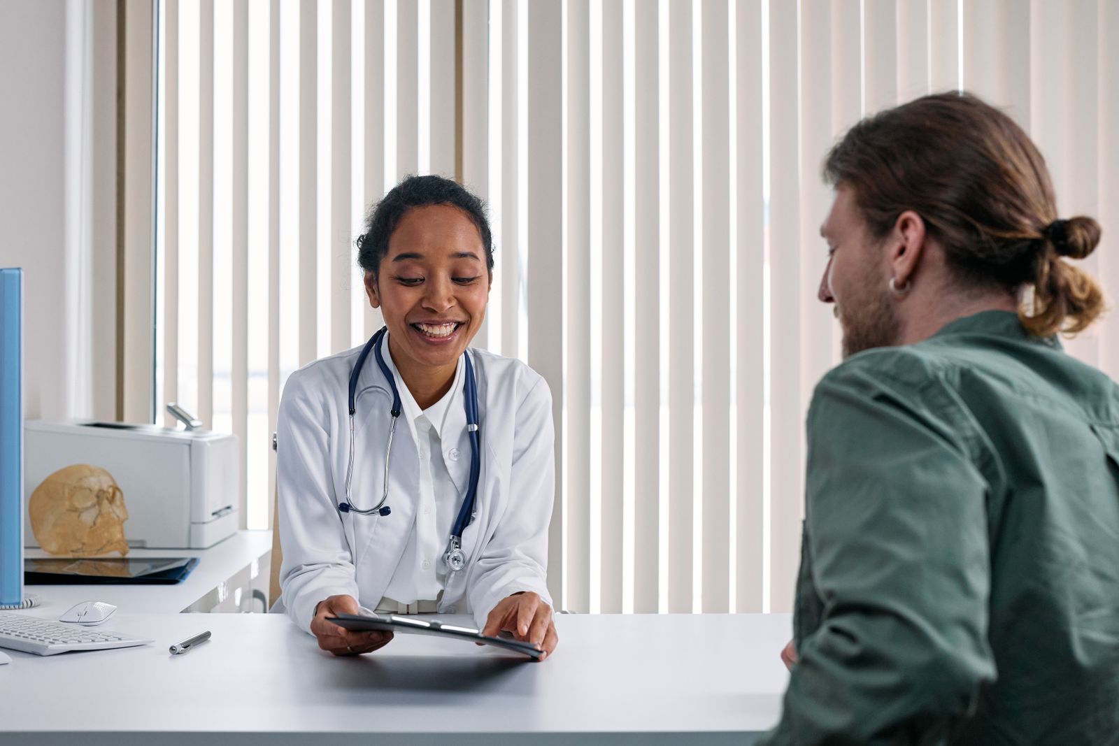 Doctor reviewing clinical information with a patient