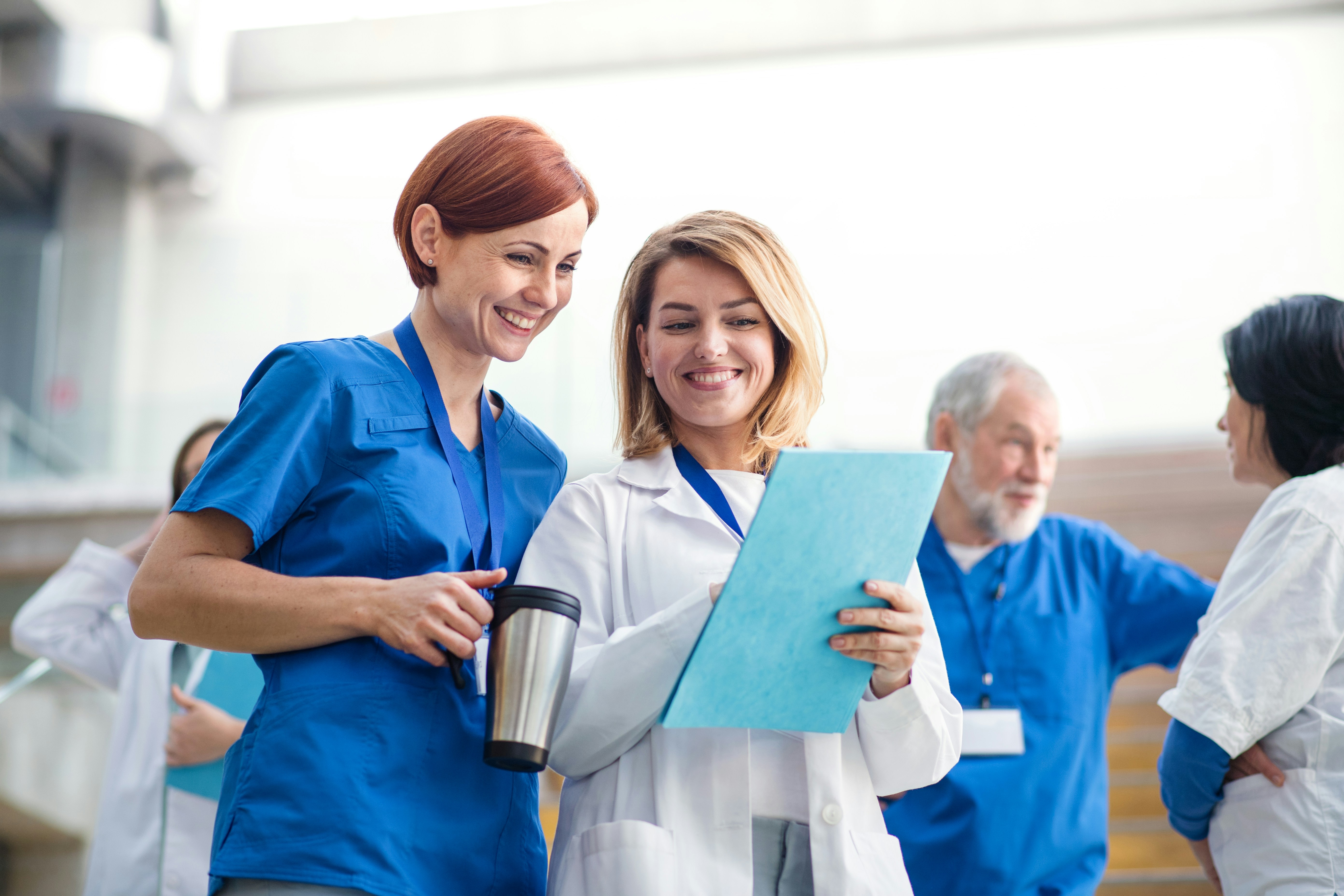 Clinicians reviewing a chart together